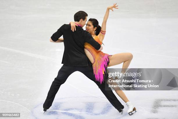 Kana Muramoto and Chris Reed of Japan compete in the ice dance short dance during the Four Continents Figure Skating Championships at Taipei Arena on...