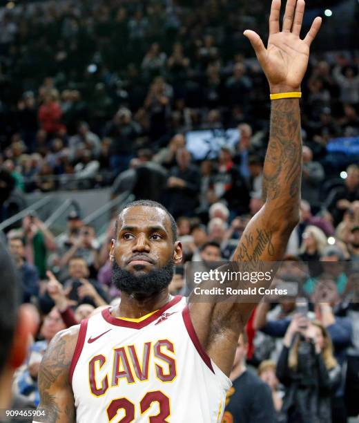 LeBron James of the Cleveland Cavaliers acknowledges the crowd after hitting his 30,001 point during game against the San Antonio Spurs at AT&T...