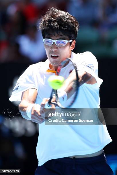 Hyeon Chung of South Korea plays a backhand in his quarter-final match against Tennys Sandgren of the United States on day 10 of the 2018 Australian...