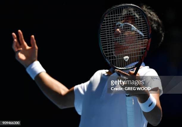 South Korea's Hyeon Chung reacts to a point against Tennys Sandgren of the US during their men's singles quarter-finals match on day 10 of the...