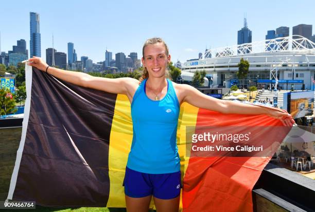 Elise Mertens of Belgium poses with the Belgian flag on day ten of the 2018 Australian Open at Melbourne Park on January 23, 2018 in Melbourne,...