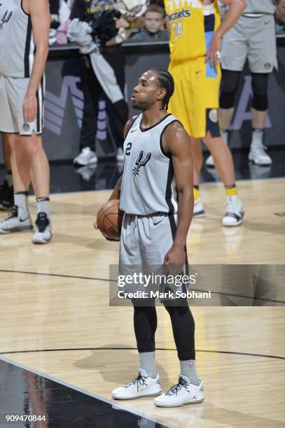 Kawhi Leonard of the San Antonio Spurs holds the ball during the game against the Denver Nuggets on January 13, 2018 at the AT&T Center in San...