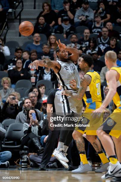 Kawhi Leonard of the San Antonio Spurs passes the ball against the Denver Nuggets on January 13, 2018 at the AT&T Center in San Antonio, Texas. NOTE...