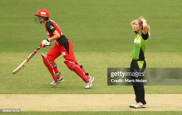 Nicola Carey of the Thunder reacts after a delivery during the Women's Big Bash League match between the Sydney Thunder and the Melbourne Renegades...
