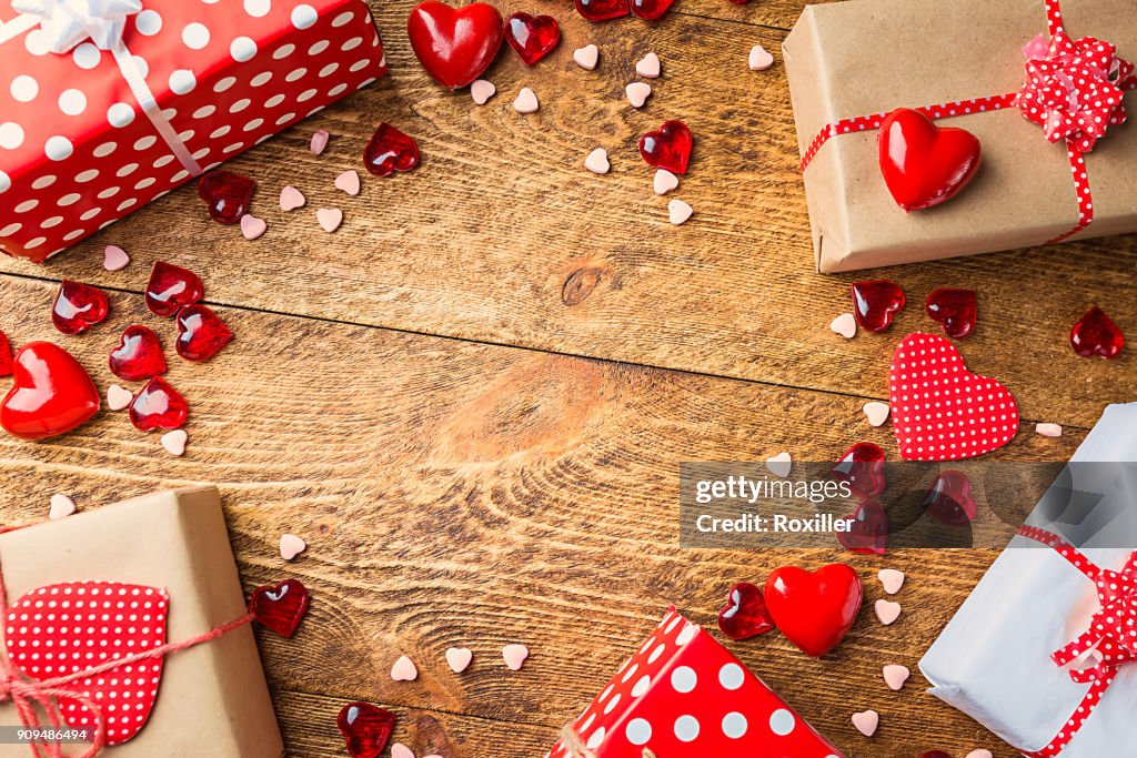 Top view of various gift boxes on wooden table