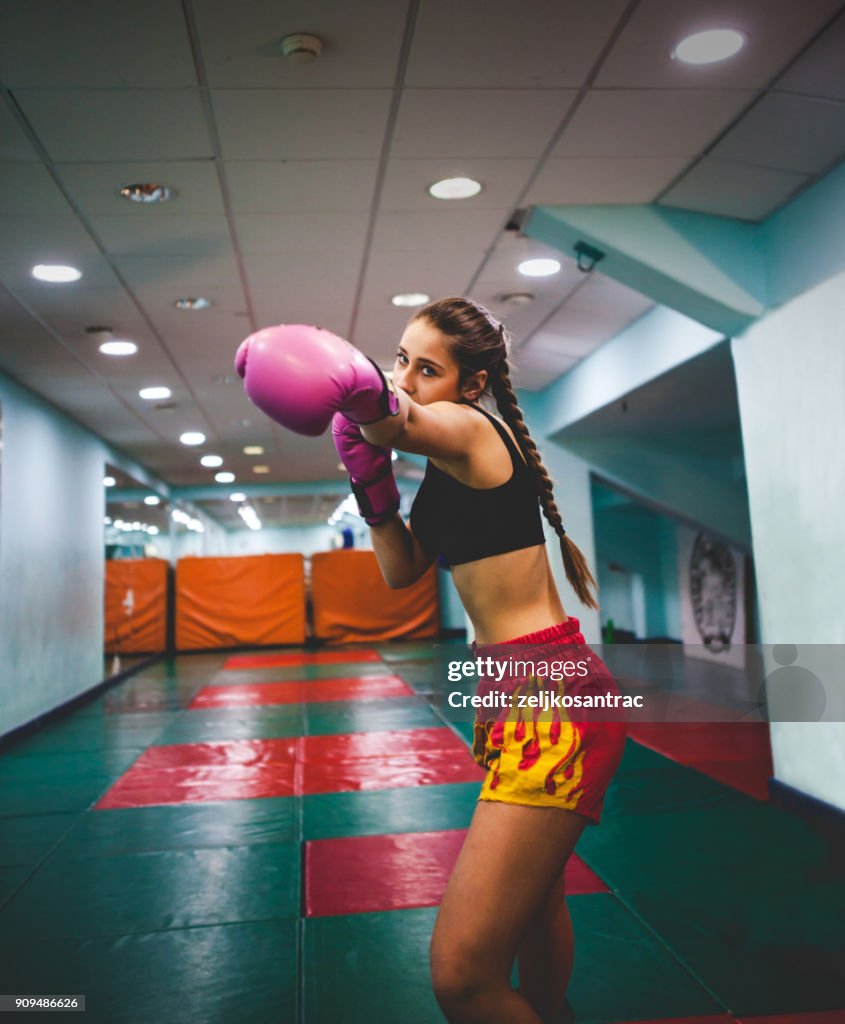 Female Kickboxer Fighter Training