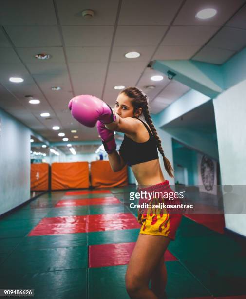 Female Kickboxer Fighter Training