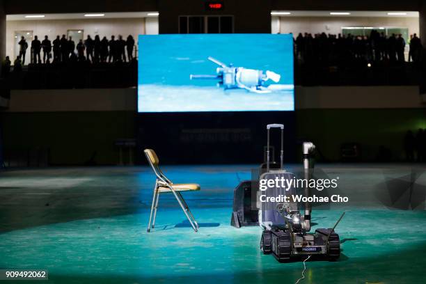 The robot detector of South Korean police SWAT team demonstrates the anti-terror operation at the starting ceremony of PyeongChang Olympic Security...