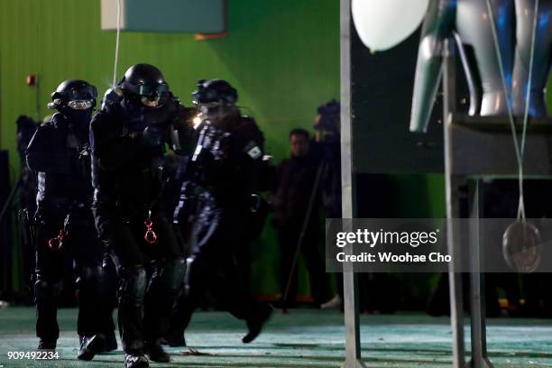 South Korean police SWAT team demonstrate the anti-terror operation at the starting ceremony of PyeongChang Olympic Security Force before the...