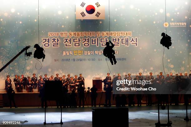 South Korean police SWAT team demonstrate the anti-terror operation at the starting ceremony of PyeongChang Olympic Security Force before the...