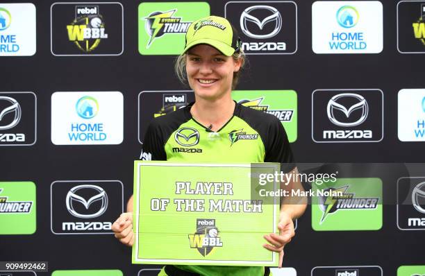 Player of the match Nicola Carey of the Thunder poses for a photo after the Women's Big Bash League match between the Sydney Thunder and the...