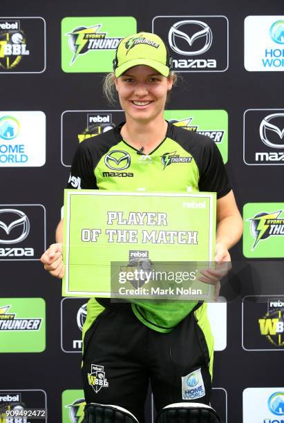 Player of the match Nicola Carey of the Thunder poses for a photo after the Women's Big Bash League match between the Sydney Thunder and the...