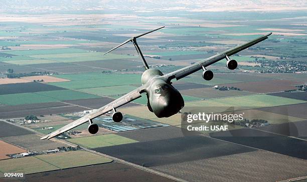 An air-to-air front view of a C-5B Galaxy aircraft from the 22nd Military Airlift Squadron.