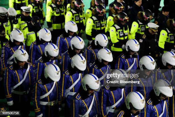 South Korean police officers bow during the inauguration ceremony for the designated special police battalion of the 2018 PyeongChang Winter Olympic...