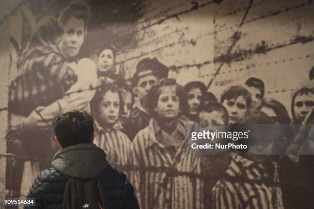 View of a person visiting a permanent exhibition inside the Auschwitz 1 camp seen just a few days ahead of the 73rd anniversary of the liberation of...
