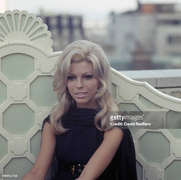 American singer and actress Nancy Sinatra posed at a hotel roof garden in London on 8th May 1967.