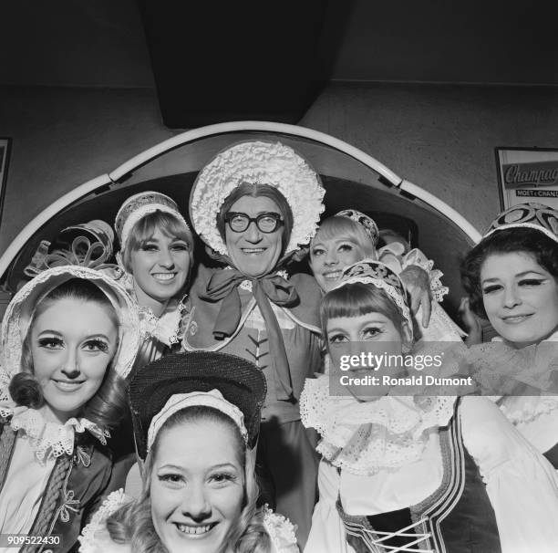 British comedian and actor Arthur Askey , who plays the role of Dame Durden in the pantomime 'Jack and the Beanstalk', with co-stars, London, UK,...