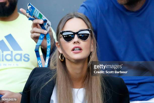 Ester Satorova, wife of Tomas Berdych of the Czech Republic, looks on during his quarter final match against Roger Federer of Switzerland on day 10...