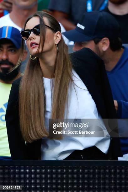 Ester Satorova, wife of Tomas Berdych of the Czech Republic, looks on during his quarter final match against Roger Federer of Switzerland on day 10...