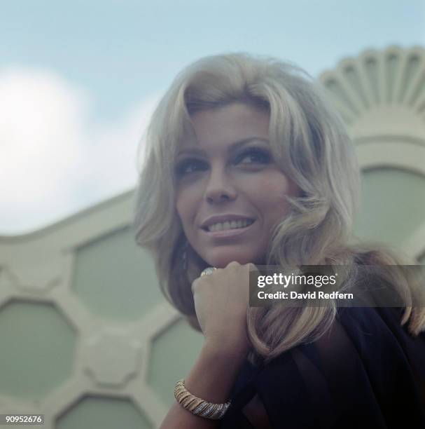 American singer and actress Nancy Sinatra posed at a hotel roof garden in London on 8th May 1967.