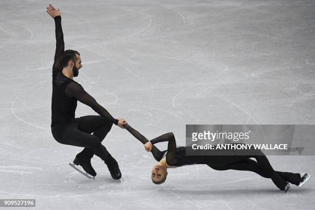 Ashley Cain and Timothy Leduc of the US perform during the pairs short program at the ISU Four Continents figure skating championships in Taipei on...