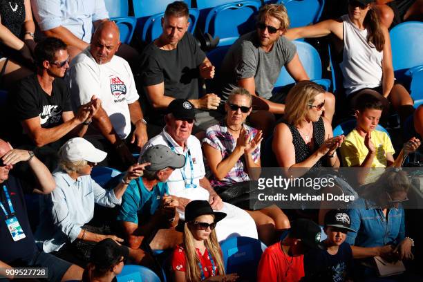 Bec Hewitt watches her husbane Lleyton Hewitt of Australia and Sam Groth of Australia compete in their quarter-final match against Juan Sebastian...