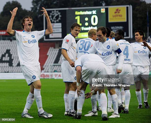 Players of Karlsruhe celebrates after team mate Matthias Langkamp scores the his team's first goal during the Second Bundesliga match between...