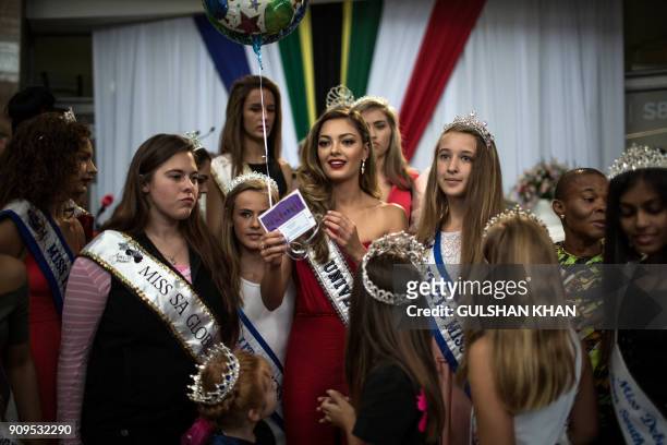 Miss Universe 2017 Demi-Leigh Nel-Peters is surrounded by young beauty queens as she arrives home to South Africa for the first time after being...