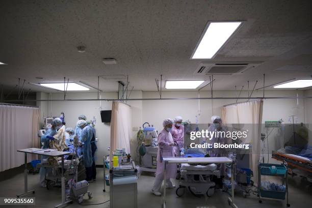 Doctors and nurses treat participants acting injured during a sarin attack drill at a hospital in Chiba, Japan, on Wednesday, Jan. 24, 2018. Japans...