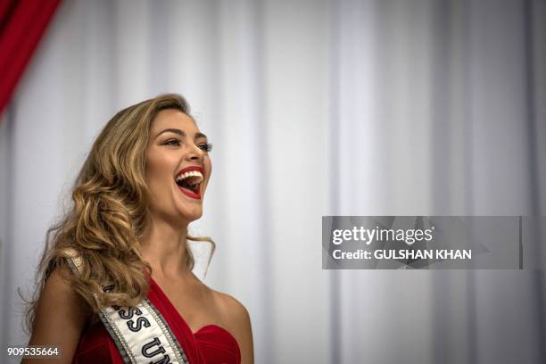 Miss Universe 2017 Demi-Leigh Nel-Peters smiles as she arrives home to South Africa for the first time after being crowned at OR Tambo International...