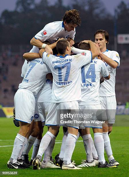 Players of Karlsruhe celebrates after Alexander Iashvili scores his team's second goal during the Second Bundesliga match between Karlsruher SC and...