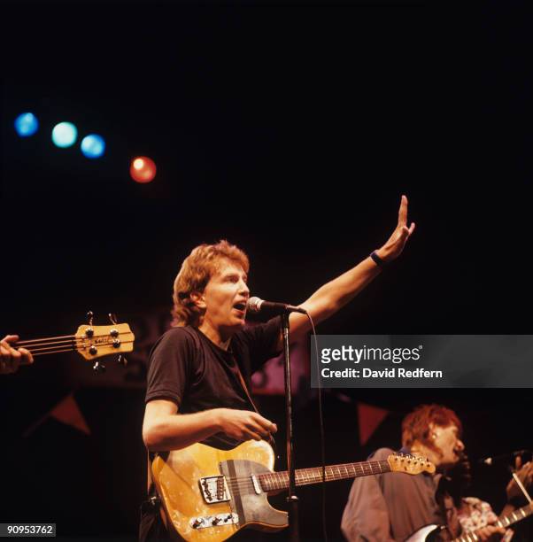 Tom Robinson performs on stage in London, England in October 1984.