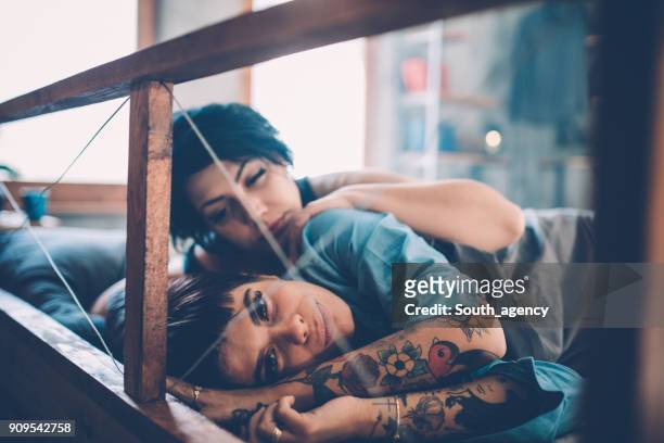 relationship crisis - lesbian bed stock pictures, royalty-free photos & images