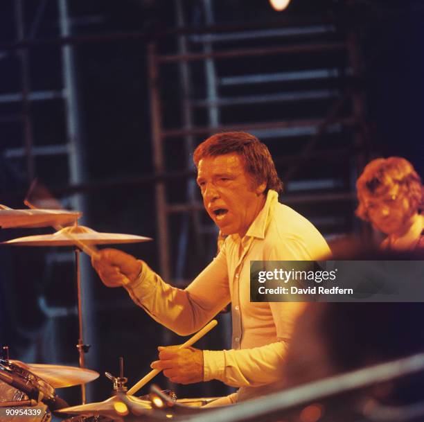 American jazz drummer Buddy Rich performs live on stage at his drum kit during a concert at the Wollman Theatre in Central Park as part of the...