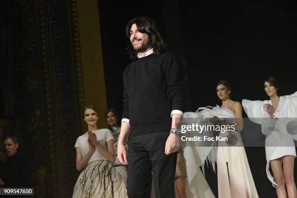 Stephane Rolland poses with his model at the inale of the Stephane Rolland Haute Couture Spring Summer 2018 show as part of Paris Fashion Week on...