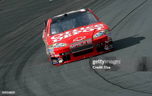 Tony Stewart, driver of the Office Depot Chevrolet, rounds turn two during practice for the NASCAR Sprint Cup Series Sylvania 300 at the New...