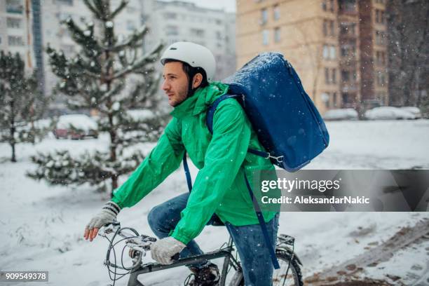 delivery boy on a bike - bike messenger stock pictures, royalty-free photos & images