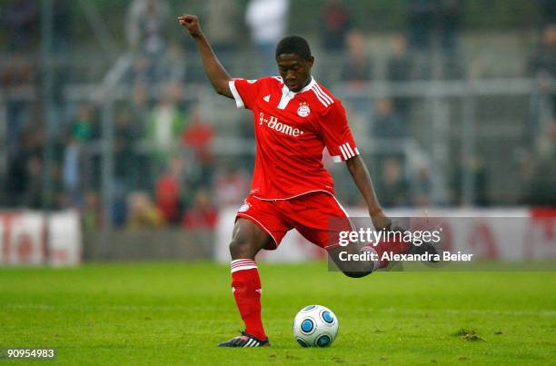 David Alaba of Muenchen kicks the ball during the Third Liga match between Bayern Muenchen II and SSV Jahn Regensburg at the Gruenwalder Stadium on...