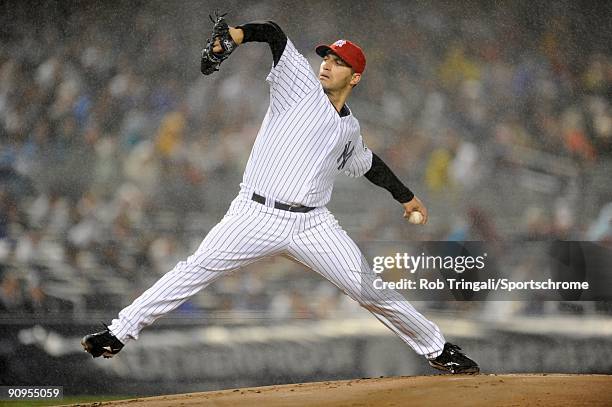 Andy Pettitte of the the New York Yankees pitches during a game against the Baltimore Orioles at Yankee Stadium on September 11, 2009 in the Bronx...