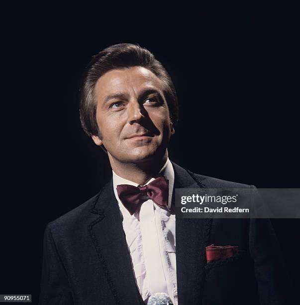 Des O'Connor performs on stage in the 1960's.