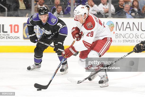 Lauri Korpikoski of the Phoenix Coyotes carries the puck against Jack Johnson of the Los Angeles Kings on September 15, 2009 at Staples Center in Los...