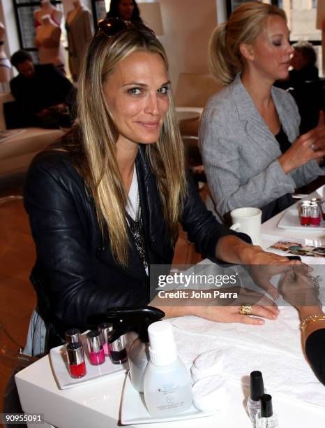 Actress Molly Sims attends the Victoria's Secret Fashion Week Suite at Bryant Park Hotel on September 16, 2009 in New York City.