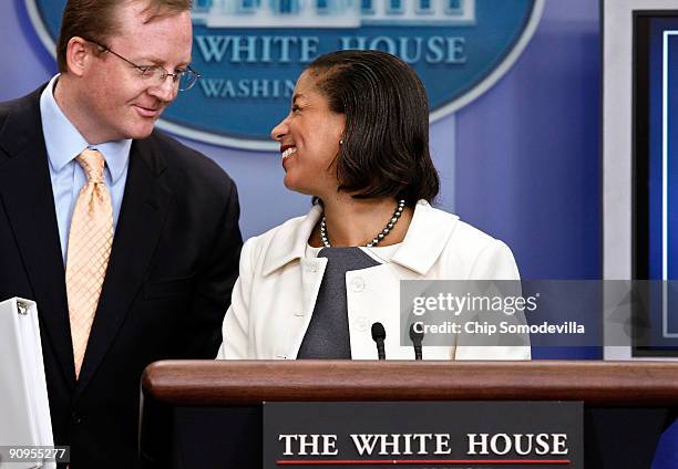 United Nations Ambassador Susan Rice gives the podium back to Press Secretary Robert Gibbs after a press briefing at the White House September 18,...