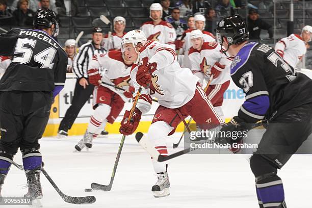 Kyle Turris of the Phoenix Coyotes shoots past Teddy Purcell of the Los Angeles Kings on September 15, 2009 at Staples Center in Los Angeles,...