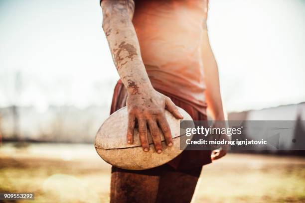 rugby is rough - mud runner stock pictures, royalty-free photos & images