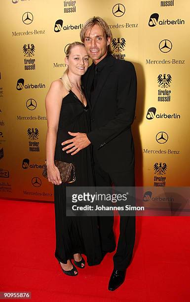 Former ski jumper Sven Hannawald and Marie Therese Mueller attend the United People Charity Night on September 18, 2009 in Munich, Germany.