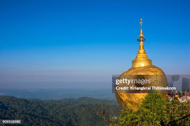 praying respect to kyaiktiyo pagoda, myanmar. - kyaiktiyo pagoda stock pictures, royalty-free photos & images