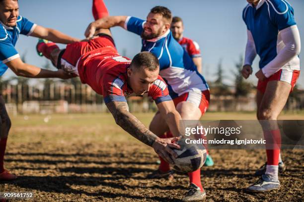 jumping to win - rugby league stock pictures, royalty-free photos & images