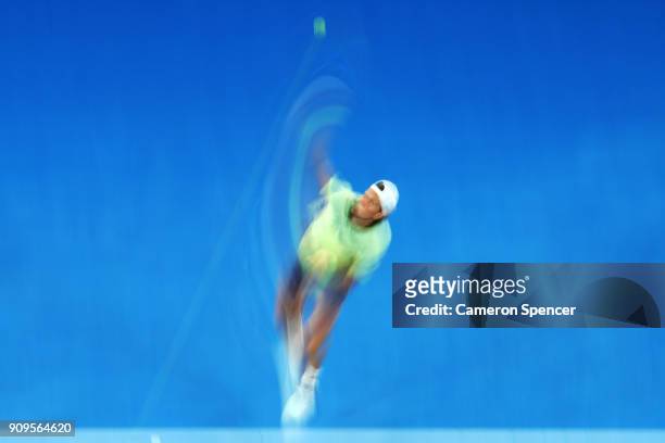 Tomas Berdych of the Czech Republic serves in his quarter-final match against Roger Federer of Switzerland on day 10 of the 2018 Australian Open at...