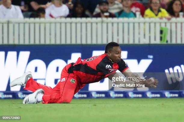 Kieron Pollard of the Renegades takes a catch to dismiss Shane Watson of the Thunder during the Big Bash League match between the Sydney Thunder and...